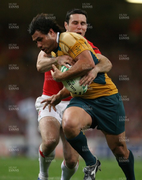 15.09.07  Wales v Australia... Wales Stephen Jones tackles  George Smith. 