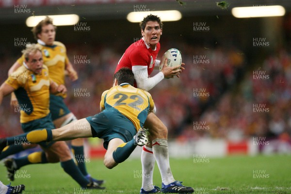 15.09.07  Wales v Australia... Australia's  Julian Huxley gets hold of James Hook.  