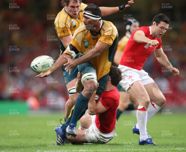 15.09.07 -Wales v Australia, RWC 2007 -  Australia's Wycliff Palu offloads as Mark Jones tackles 
