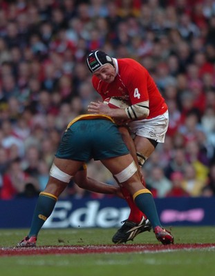 04.11.06  Wales v Australia.  Wales Ian Gough is stopped in his tracks by Rocky Elsom.  