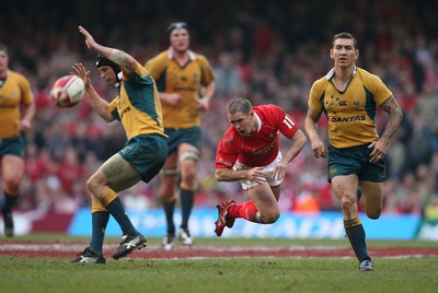 04.11.06  Wales v Australia, Invesco Perpetual Series 2006 Wales' Shane Williams is checked by Stephen Larkham 