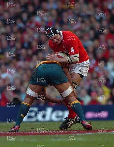 04.11.06  Wales v Australia.  Wales Ian Gough is stopped in his tracks by Rocky Elsom.  