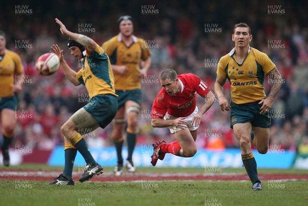04.11.06  Wales v Australia, Invesco Perpetual Series 2006 Wales' Shane Williams is checked by Stephen Larkham 
