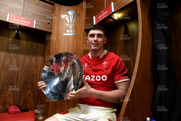 201121 - Wales v Australia - Autumn Nations Series - Seb Davies of Wales in the dressing room with the James Bevan Trophy at the end of the game