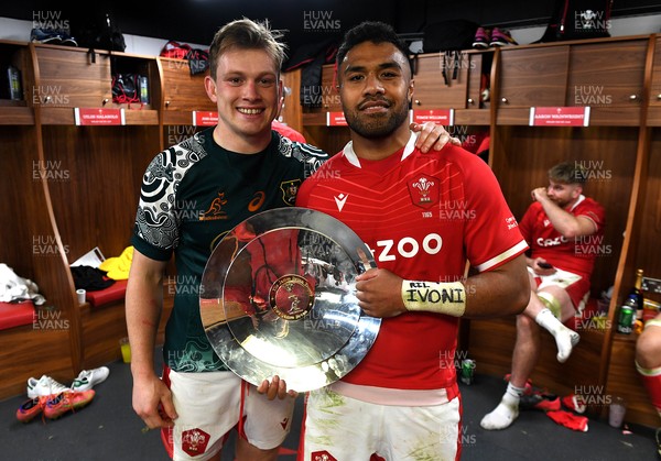 201121 - Wales v Australia - Autumn Nations Series - Nick Tompkins and Willis Halaholo of Wales in the dressing room with the James Bevan Trophy at the end of the game
