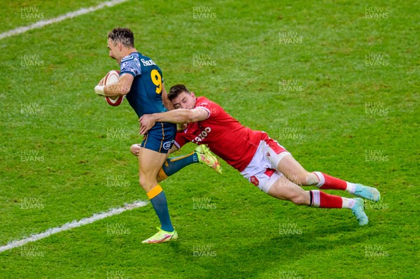201121 - Wales v Australia - Autumn Nations Series - Josh Adams of Wales tackles by Nic White of Australia 