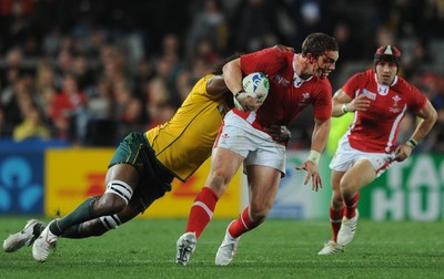 21.10.11 - Wales v Australia - Rugby World Cup Bronze Final - George North of Wales is tackled by Radike Samo of Australia. 