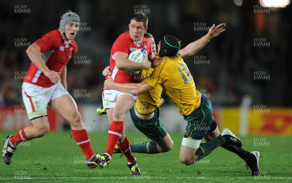 21.10.11 - Wales v Australia - Rugby World Cup Bronze Final - Shane Williams of Wales takes on Rob Horne and Berrick Barnes of Australia. 