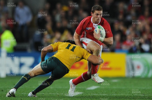 21.10.11 - Wales v Australia - Rugby World Cup Bronze Final - George North of Wales takes on Digby Ioane of Australia. 