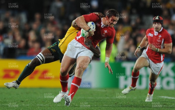 21.10.11 - Wales v Australia - Rugby World Cup Bronze Final - George North of Wales is tackled by Radike Samo of Australia. 