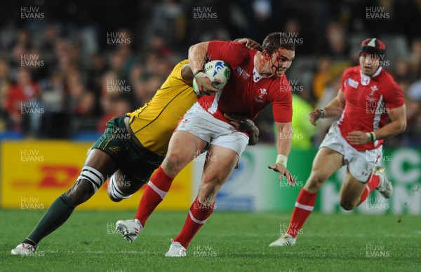 21.10.11 - Wales v Australia - Rugby World Cup Bronze Final - George North of Wales is tackled by Radike Samo of Australia. 