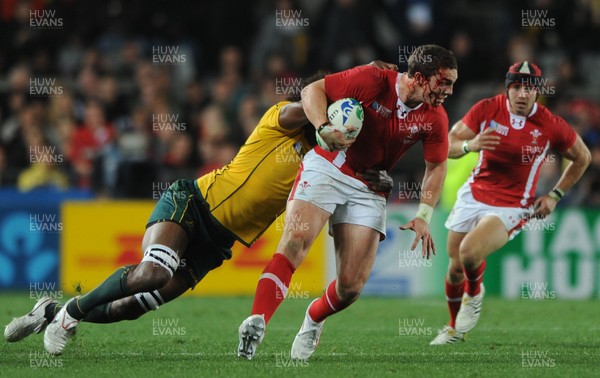 21.10.11 - Wales v Australia - Rugby World Cup Bronze Final - George North of Wales is tackled by Radike Samo of Australia. 