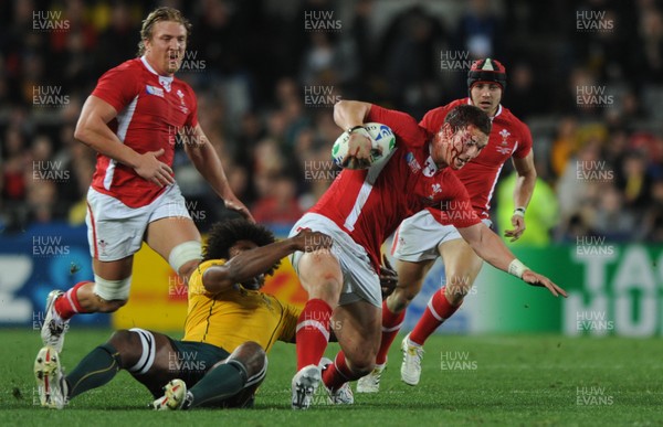 21.10.11 - Wales v Australia - Rugby World Cup Bronze Final - George North of Wales is tackled by Radike Samo of Australia. 