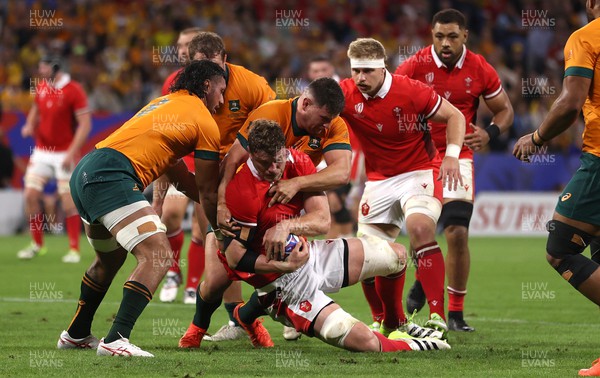 240923 - Wales v Australia - Rugby World Cup France 2023 - Pool C -  Will Rowlands of Wales is tackled by David Porecki of Australia