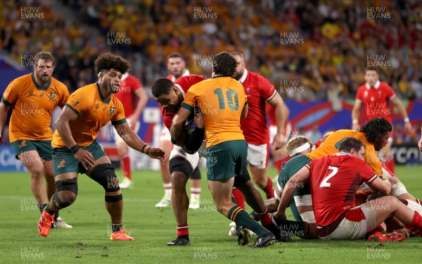 240923 - Wales v Australia - Rugby World Cup France 2023 - Pool C -  Taulupe Faletau of Wales is tackled by Ben Donaldson of Australia