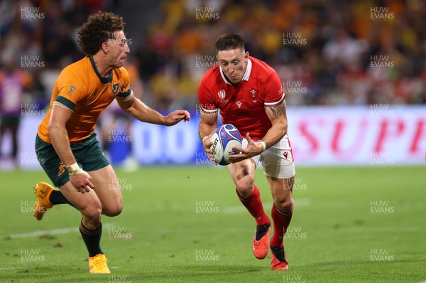 240923 - Wales v Australia - Rugby World Cup France 2023 - Pool C -  Josh Adams of Wales is tackled by Mark Nawaqanitawase of Australia