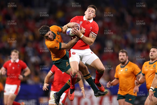 240923 - Wales v Australia - Rugby World Cup France 2023 - Pool C -  Josh Adams of Wales and Ben Donaldson of Australia compete in the air