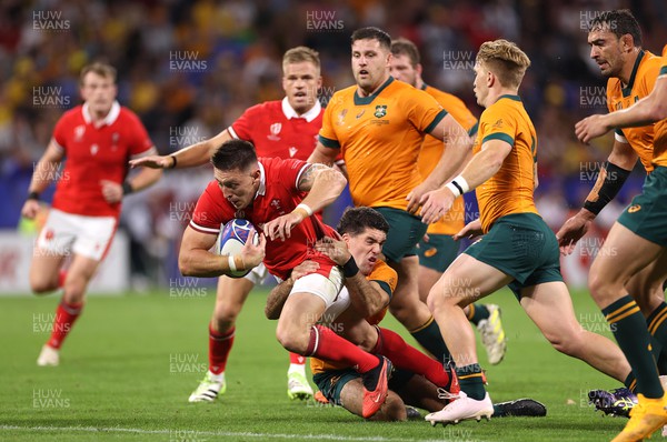 240923 - Wales v Australia - Rugby World Cup France 2023 - Pool C -  Josh Adams of Wales stopped by Ben Donaldson of Australia