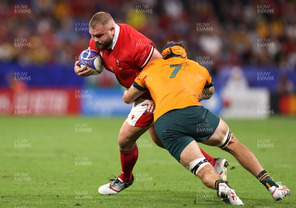 240923 - Wales v Australia - Rugby World Cup France 2023 - Pool C -  Tomas Francis of Wales is tackled by Tom Hooper of Australia