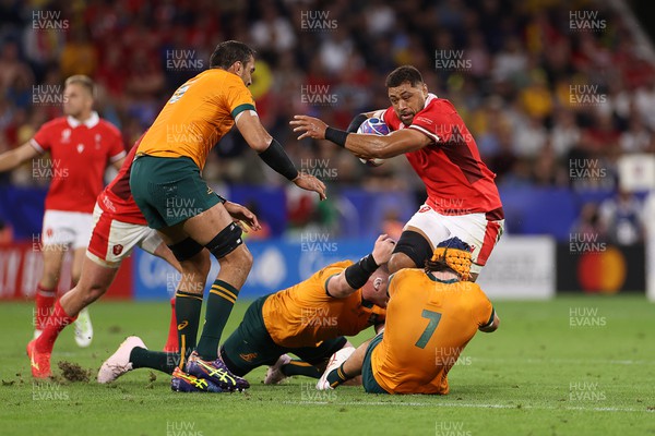 240923 - Wales v Australia - Rugby World Cup France 2023 - Pool C - Taulupe Faletau of Wales is tackled by Tom Hooper of Australia 