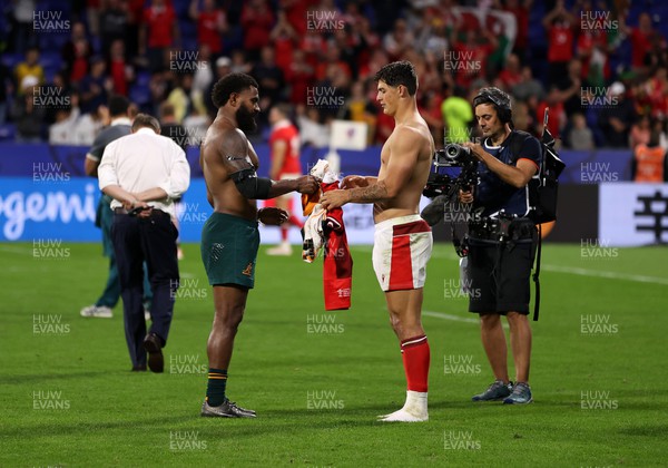 240923 - Wales v Australia - Rugby World Cup France 2023 - Pool C - Louis Rees-Zammit of Wales swaps shirts with Marika Koroibete of Australia 
