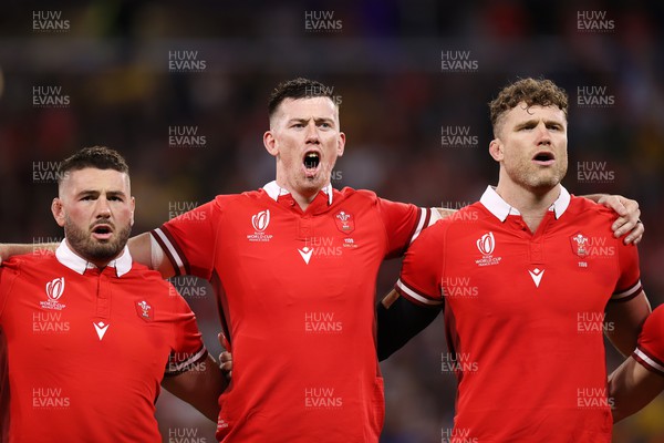 240923 - Wales v Australia - Rugby World Cup France 2023 - Pool C - Gareth Thomas, Adam Beard and Will Rowlands of Wales sing the anthem