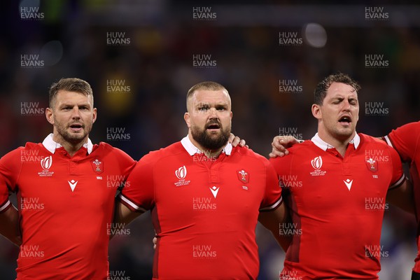 240923 - Wales v Australia - Rugby World Cup France 2023 - Pool C - Dan Biggar, Tomas Francis and Ryan Elias of Wales sing the anthem