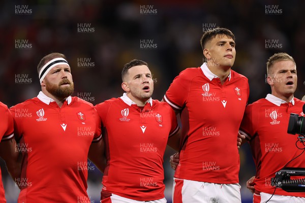 240923 - Wales v Australia - Rugby World Cup France 2023 - Pool C - Henry Thomas, Elliot Dee, Dafydd Jenkins and Gareth Anscombe of Wales sing the anthem