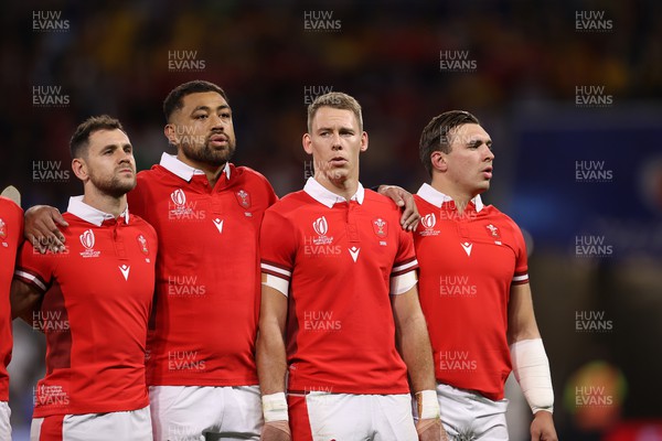 240923 - Wales v Australia - Rugby World Cup France 2023 - Pool C - Tomos Williams, Taulupe Faletau, Liam Williams and Taine Basham of Wales sing the anthem