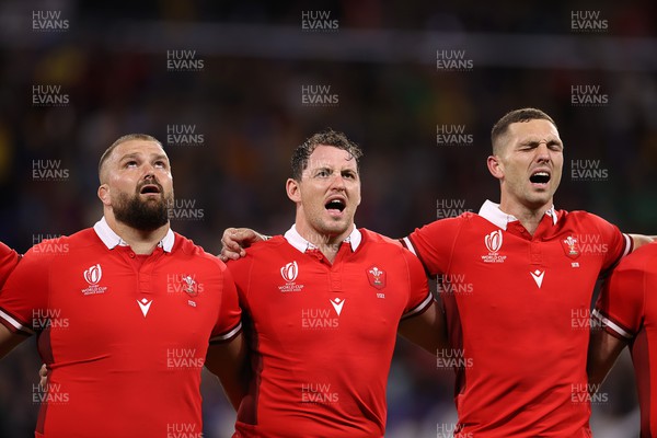 240923 - Wales v Australia - Rugby World Cup France 2023 - Pool C - Tomas Francis, Ryan Elias and George North of Wales sing the anthem