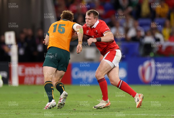 240923 - Wales v Australia - Rugby World Cup France 2023 - Pool C - Andrew Kellaway of Australia is tackled by Nick Tompkins of Wales 