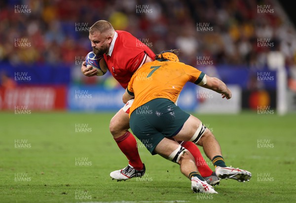 240923 - Wales v Australia - Rugby World Cup France 2023 - Pool C - Tomas Francis of Wales is tackled by Tom Hooper of Australia 