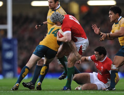 28.11.09 - Wales v Australia - Invesco Perpetual Series 2009 - Wales' Jonathan Davies is tackled by Australia's Peter Hynes. 