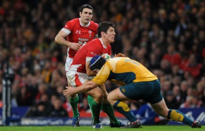 28.11.09 - Wales v Australia - Invesco Perpetual Series 2009 - Wales' Stephen Jones looks on as James Hook is tackled. 