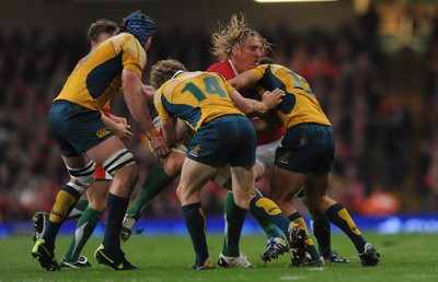 28.11.09 - Wales v Australia - Invesco Perpetual Series 2009 - Wales' Andy Powell is held by the Australian defence. 
