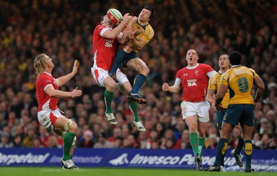 28.11.09 - Wales v Australia - Invesco Perpetual Series 2009 - Wales' Andrew Bishop competes with Australia's Adam Ashley-Cooper. 