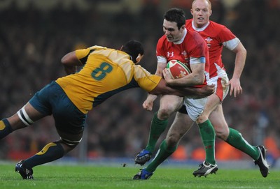 28.11.09 - Wales v Australia - Invesco Perpetual Series 2009 - Wales' Stephen Jones takes on Australia's Wycliff Palu. 