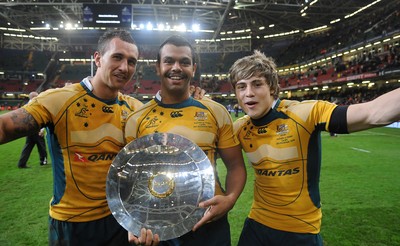 28.11.09 - Wales v Australia - Invesco Perpetual Series 2009 - Australia's Quade Cooper, Kurtley Beale and James O'Connor celebrate with the James Bevan Trophy. 