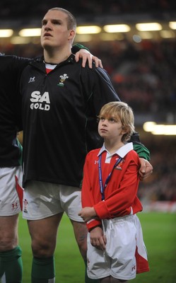 28.11.09 - Wales v Australia - Invesco Perpetual Series 2009 - Mascot Tomas Bennett lines up for the national anthems with Gethin Jenkins. 