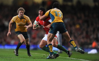 28.11.09 - Wales v Australia - Invesco Perpetual Series 2009 - Wales' Tom James is tackled by Australia's Quade Cooper. 