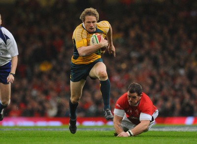 28.11.09 - Invesco Perpetual International Rugby, Wales v Australia Australia's Peter Hynes  gets past a tackle from Wales' Paul James 