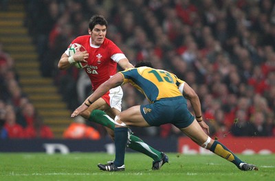 28.11.09... Wales v Australia, Invesco Perpetual 2009 Series -  Wales' James Hook is tackled by Australia's Digby Ioane  