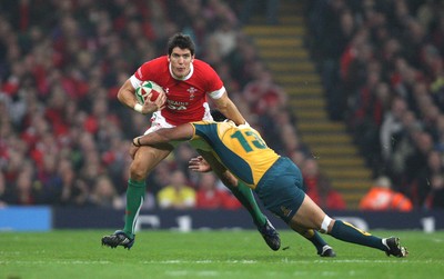 28.11.09... Wales v Australia, Invesco Perpetual 2009 Series -  Wales' James Hook is tackled by Australia's Digby Ioane  