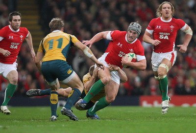 28.11.09... Wales v Australia, Invesco Perpetual 2009 Series -  Wales' Jonathan Davies is tackled 