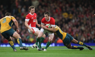 28.11.09... Wales v Australia, Invesco Perpetual 2009 Series -  Wales' Andrew Bishop is tackled by Australia's Will Genia  