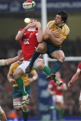 28.11.09... Wales v Australia, Invesco Perpetual 2009 Series -  Wales' Andrew Bishop is challenged by Australia's Adam Ashley-Cooper for the high ball 