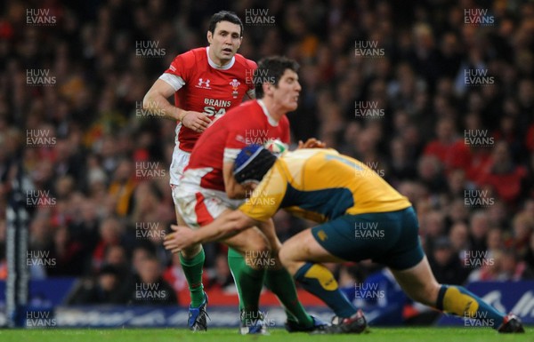 28.11.09 - Wales v Australia - Invesco Perpetual Series 2009 - Wales' Stephen Jones looks on as James Hook is tackled. 