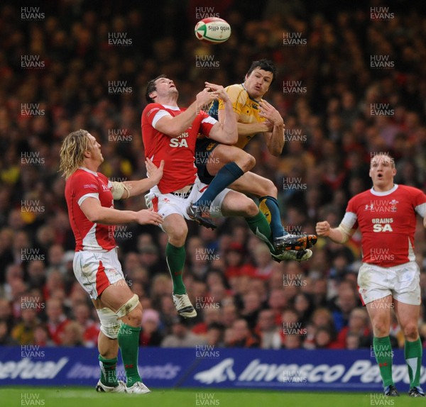 28.11.09 - Wales v Australia - Invesco Perpetual Series 2009 - Wales' Andrew Bishop competes with Australia's Adam Ashley-Cooper. 