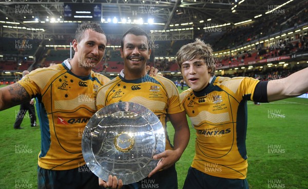 28.11.09 - Wales v Australia - Invesco Perpetual Series 2009 - Australia's Quade Cooper, Kurtley Beale and James O'Connor celebrate with the James Bevan Trophy. 