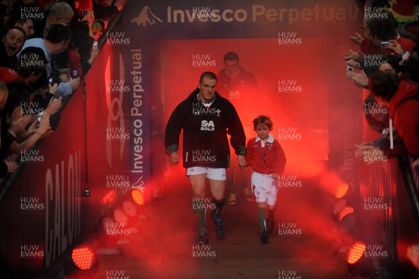 28.11.09 - Wales v Australia - Invesco Perpetual Series 2009 - Wales captain Gethin Jenkins leads out his team with mascot Tomas Bennett. 